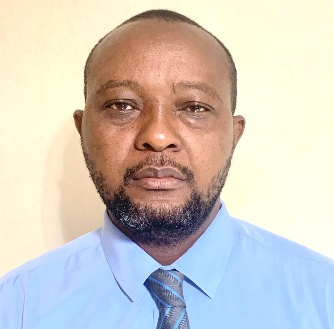 Dr Michael A Kamara